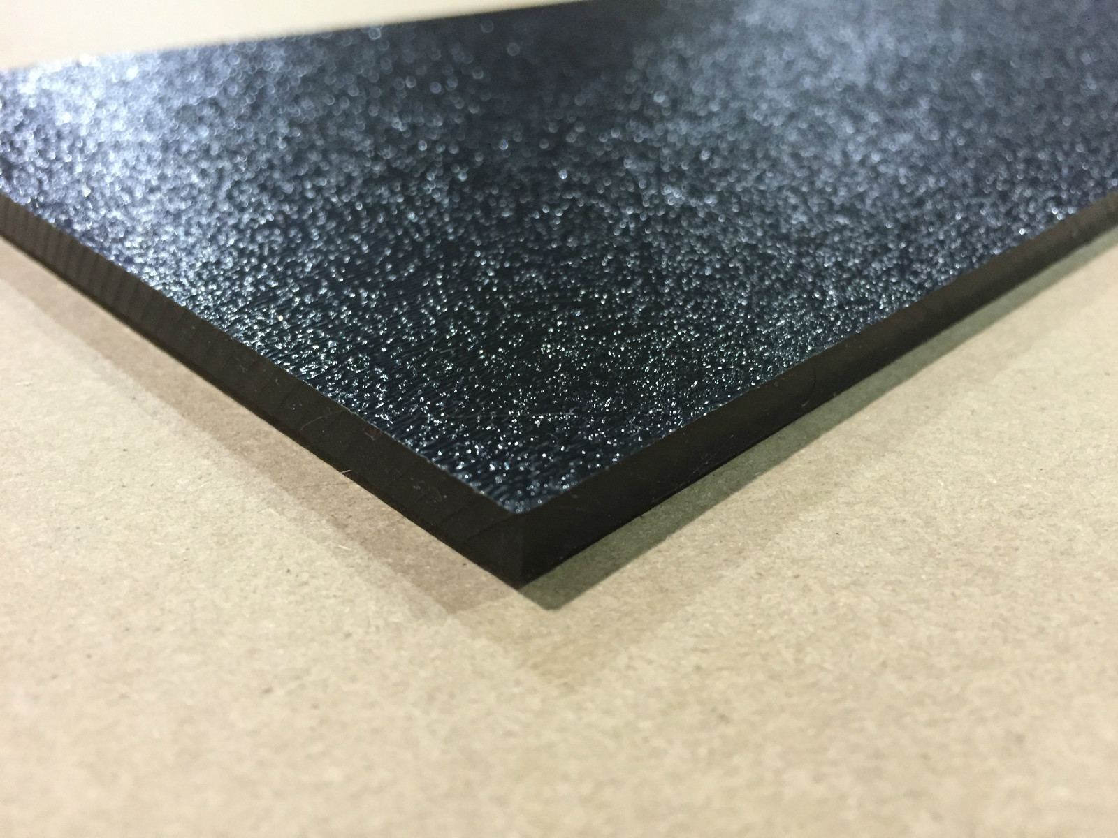 ABS Black Plastic 1/8″ x 12″ x 12″ .125″ textured 1 side stereo sheet