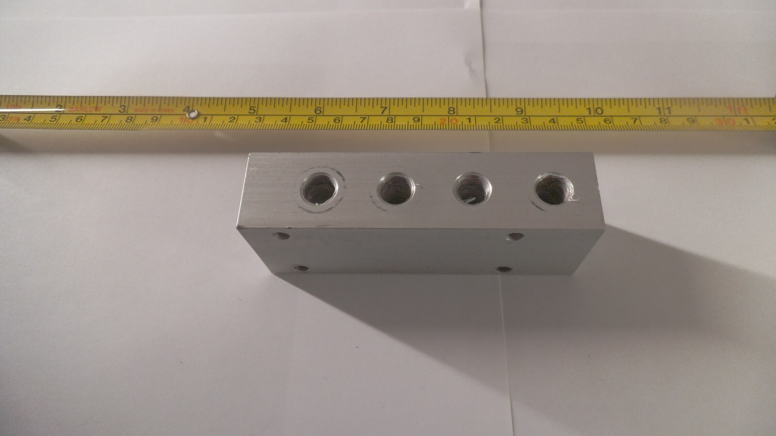 Aluminum 9 port distribution manifold 1/4 npt in, 1/8 npt x 8 out, 4 x 1-1/2 x 1