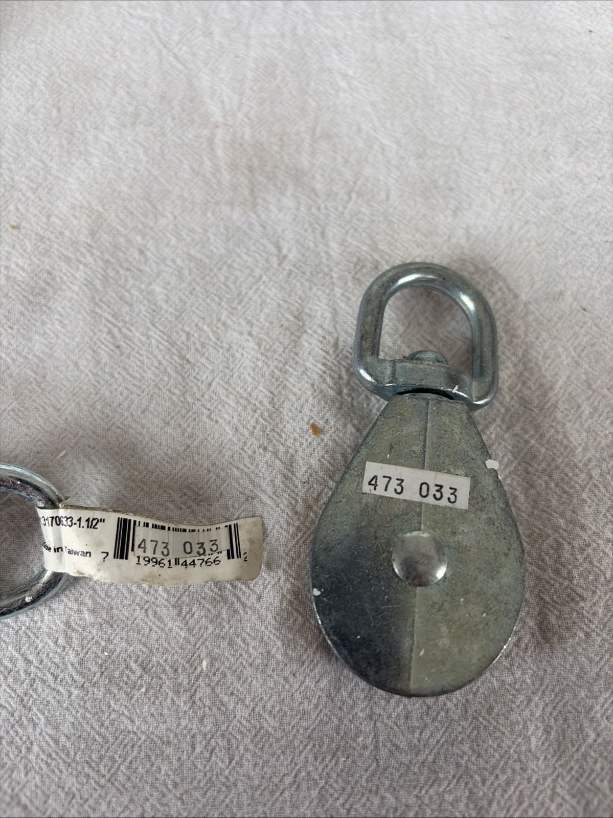 Two Swivel Pulleys for Use with Rope. See Photos for Size Specifics Provided.