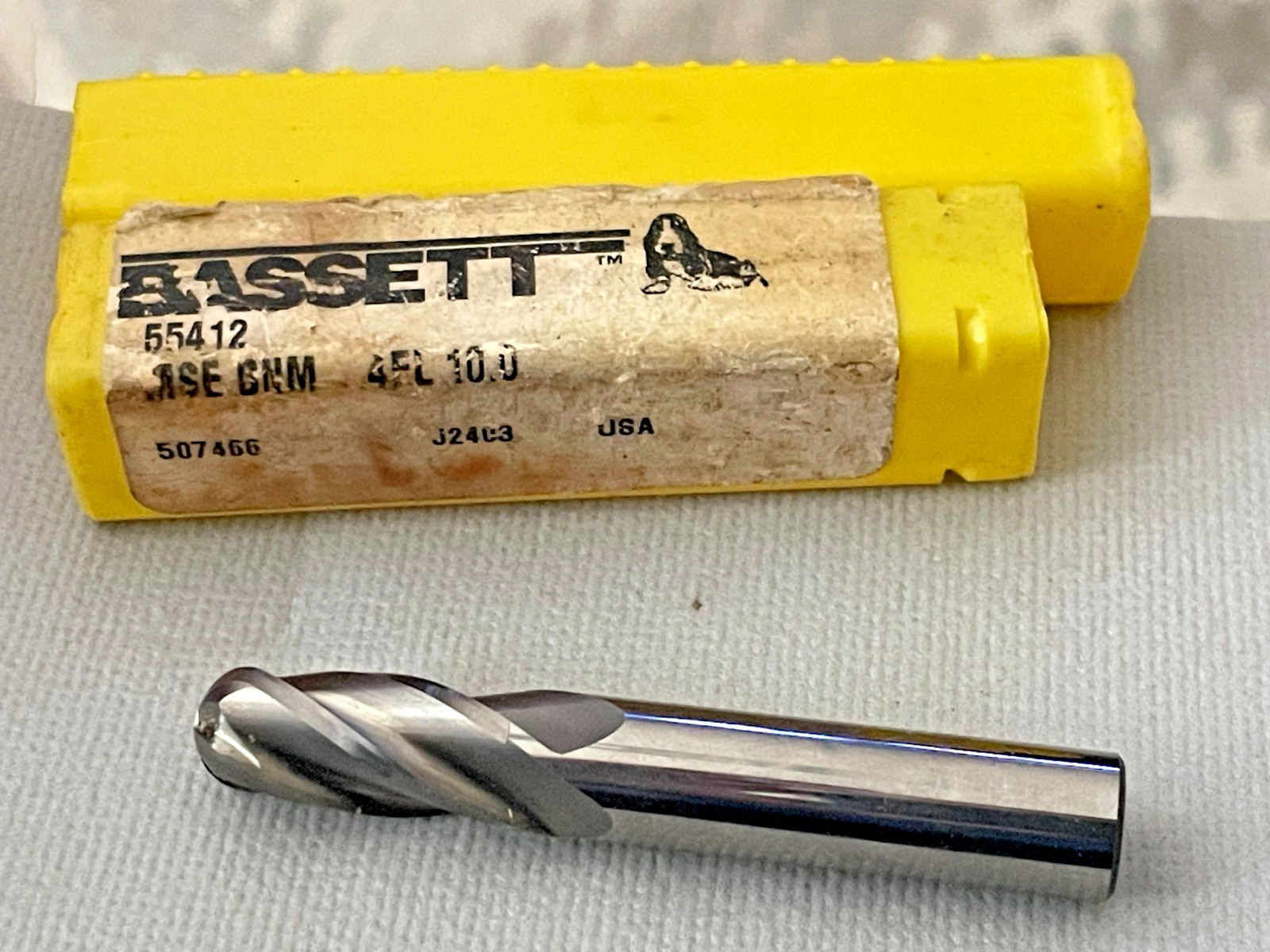 Bassett ball nose end mill, part number 55412, marked HSE BNM 4FL 10.0. High spe