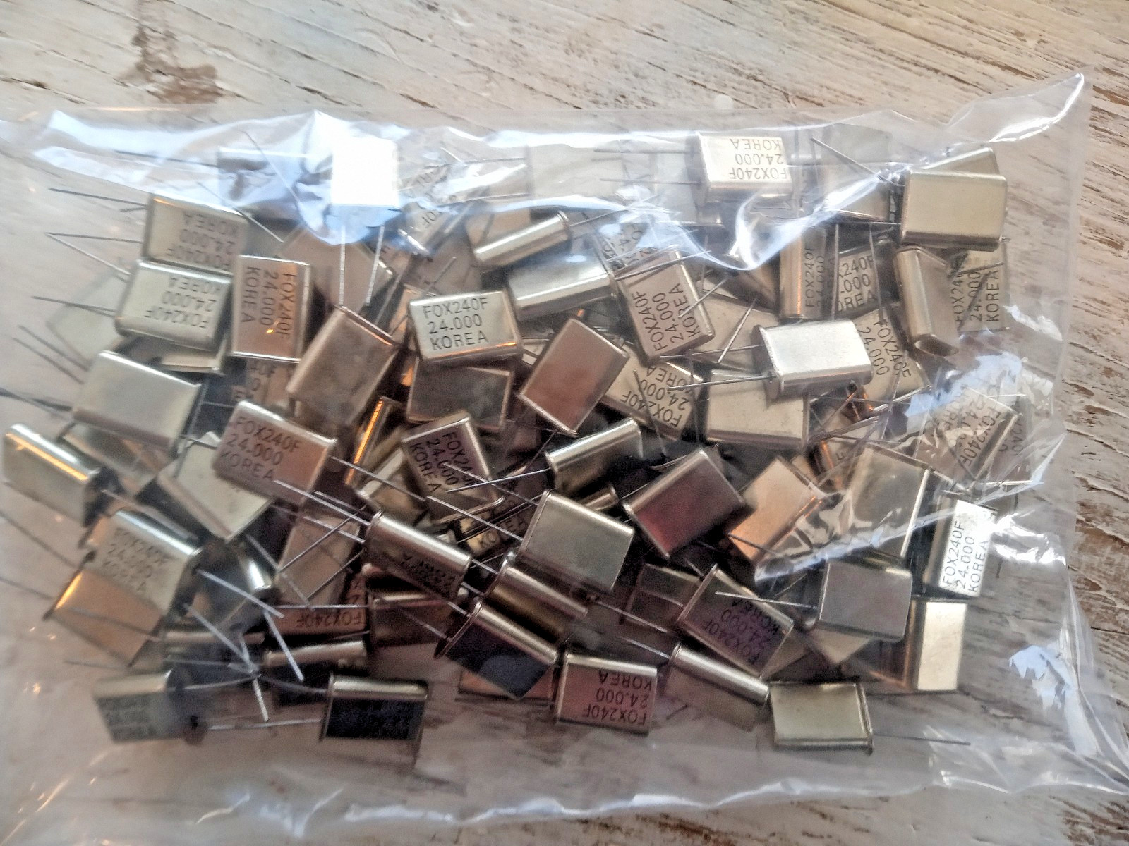 67 Pcs Quartz Crystal 24.0 MHz HC-49U Thru-hole made by Fox p/n LF200-20