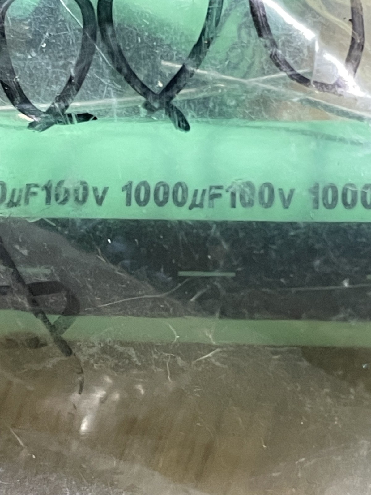 A lot of 4 Xicon Axial EL Caps TG102M2A-1840-RC, 1,000 uf, 100V, +/- 20%,105 C