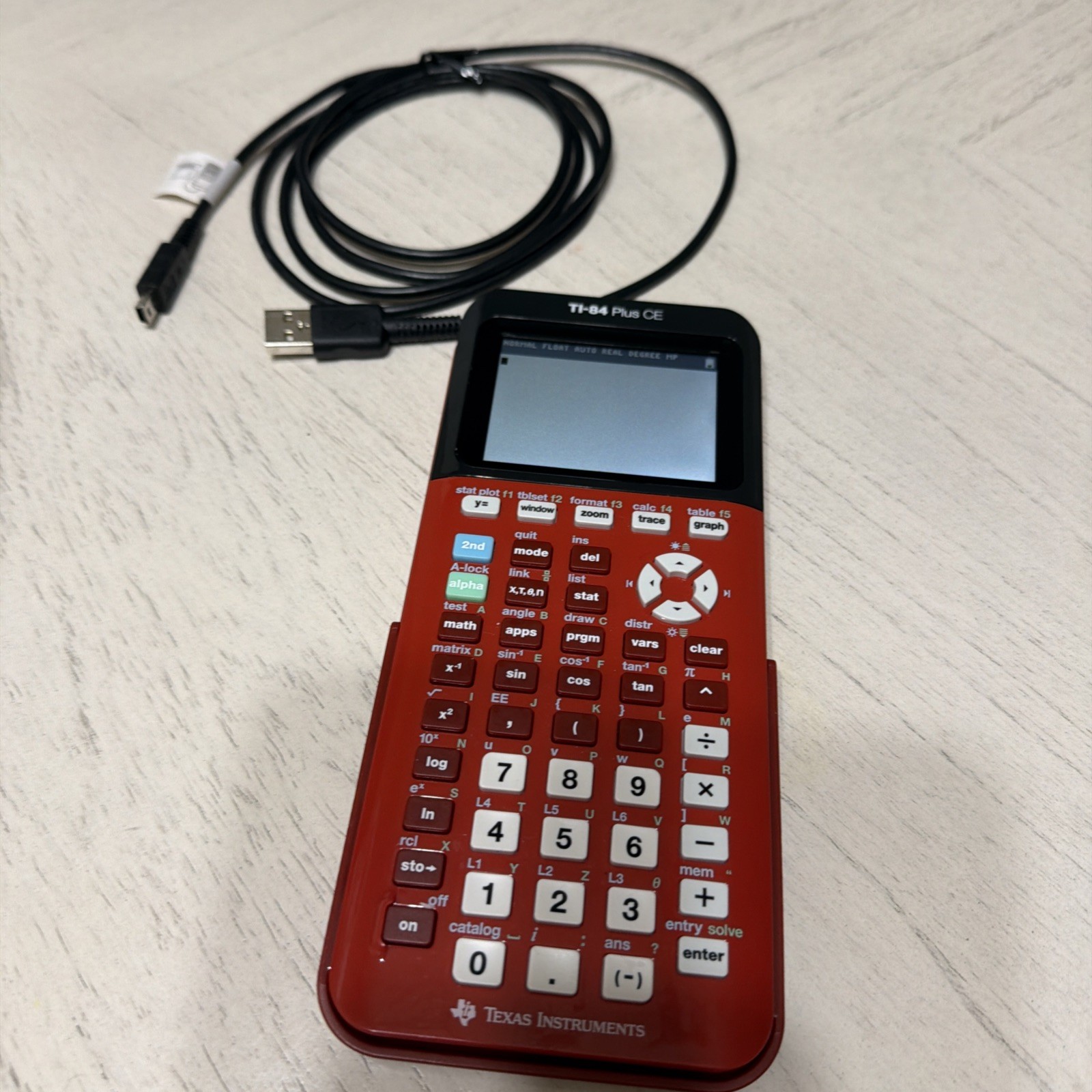Texas Instruments TI-84 Plus CE Graphing Calculator Red Charging Cable Used