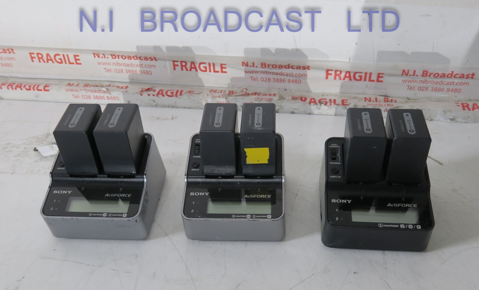 1x Sony actiforce charger with 2x lithium ion np-fh100 batteries  (26wh ) batte