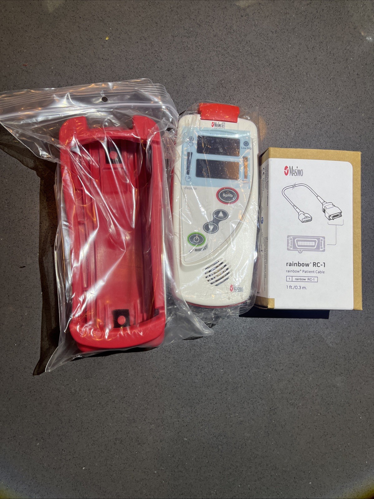 Masimo Pronto CO-Oximeter -with Rainbow Rc Adaptor And Red Protective Case NEW