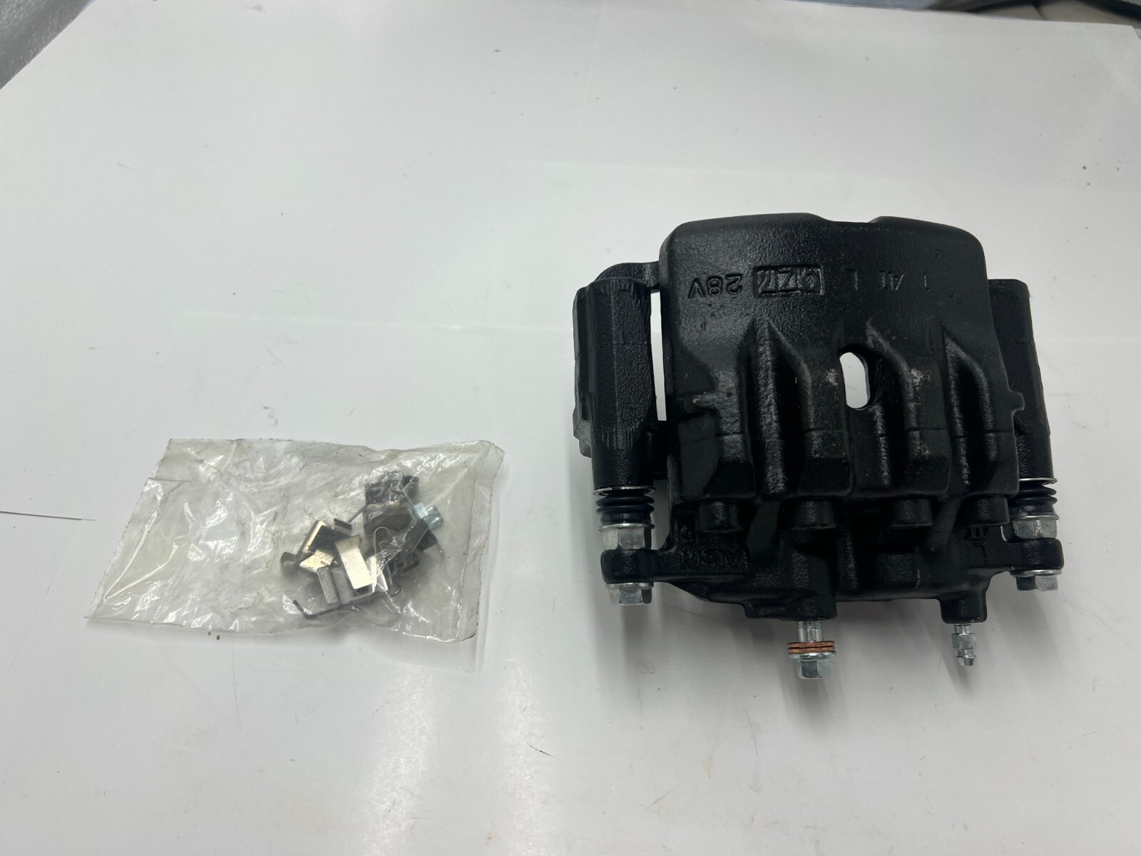 AISIN Brake Caliper 28v (0Z7) Powder Coated Finish Cast Iron Replacement