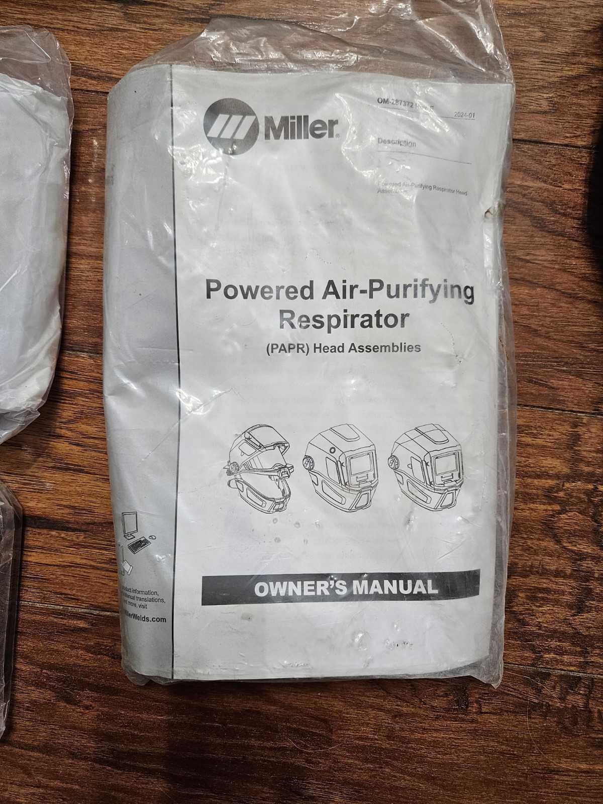 Miller T94iH-R Auto-Darkening Welding Helmet PAPR Kit W/Batteries, Hose, and Bag