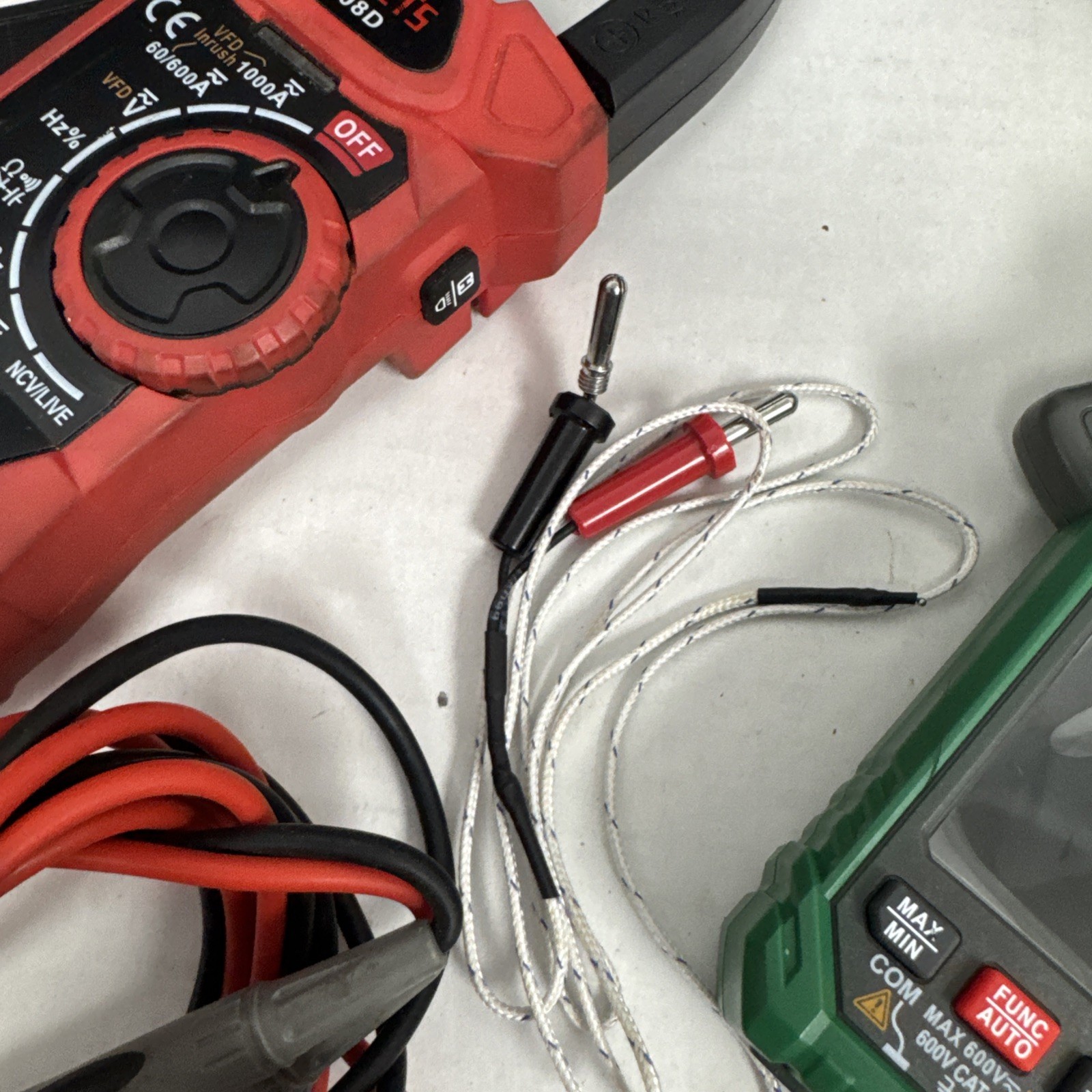 Lot of 3 CLAMP METERS & TESTERS – SEE DETAILS – TCM-300D, HT208D, CL120