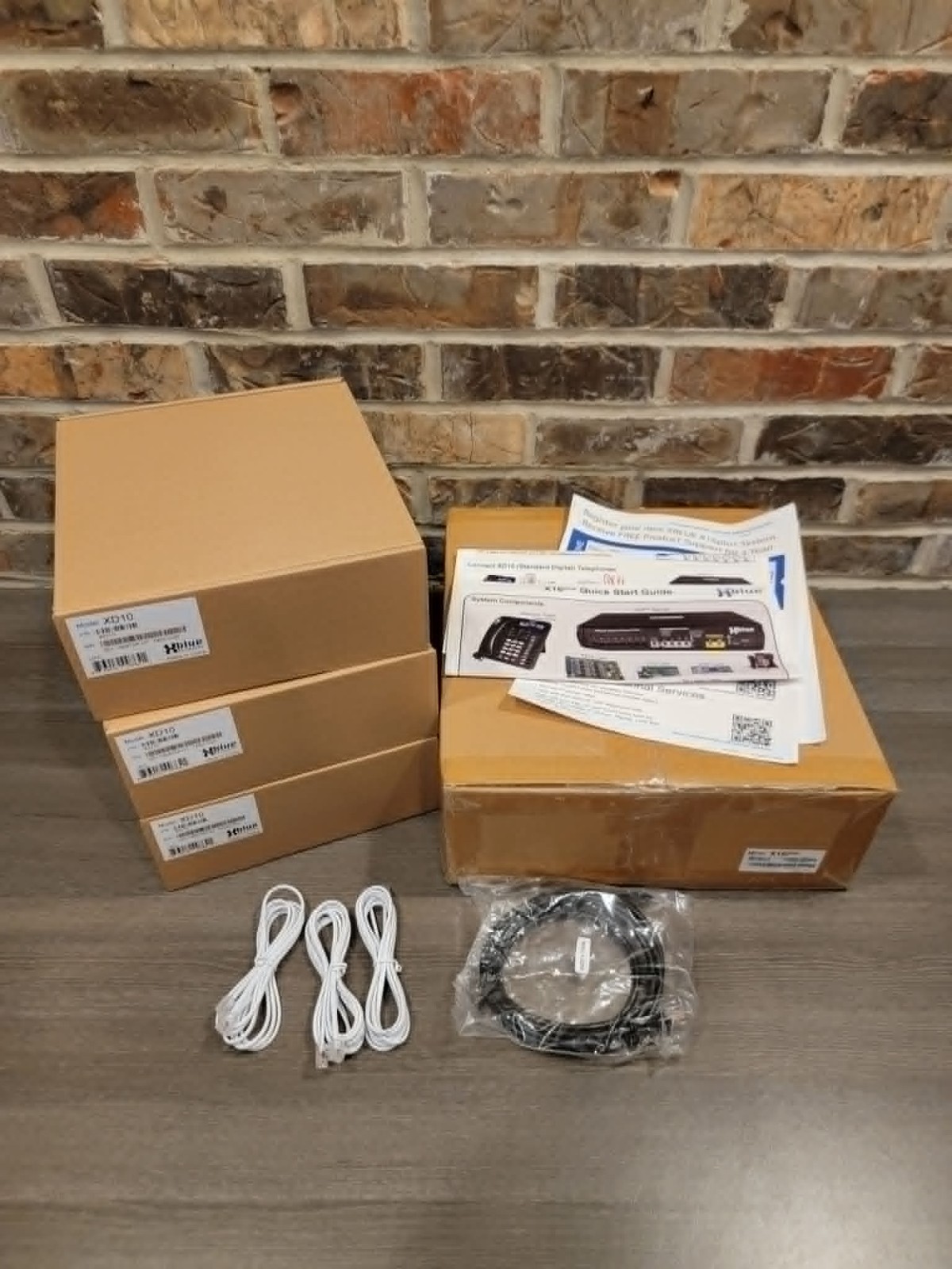 New XBlue X16 Plus Hybrid business phone system bundle with 4 digital phones