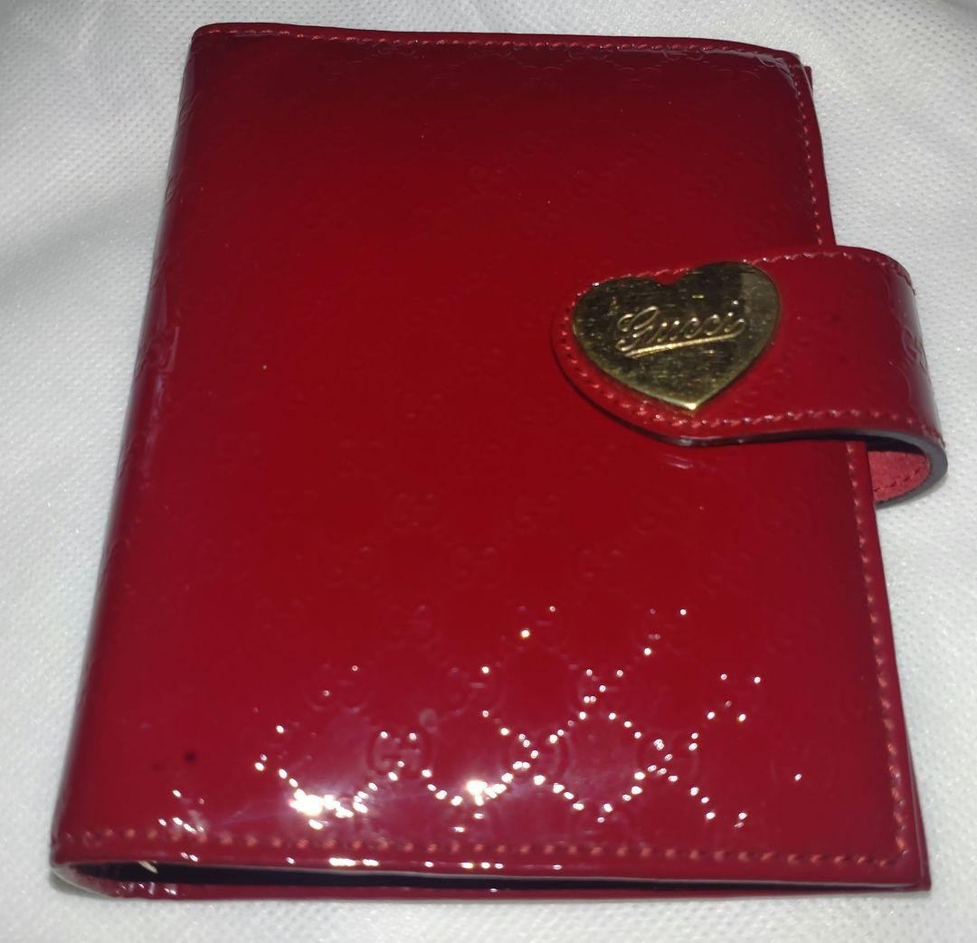 Gucci Red Enamel Notebook Cover with GG Pattern & Heart Snap Closure Used