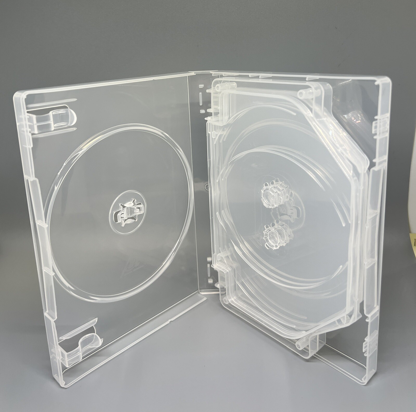 25 PCS NEW HIGH QUALITY 27MM MULTI-8 DISC DVD CASE, M-LOCK HUB, CLEAR, DB27-8C