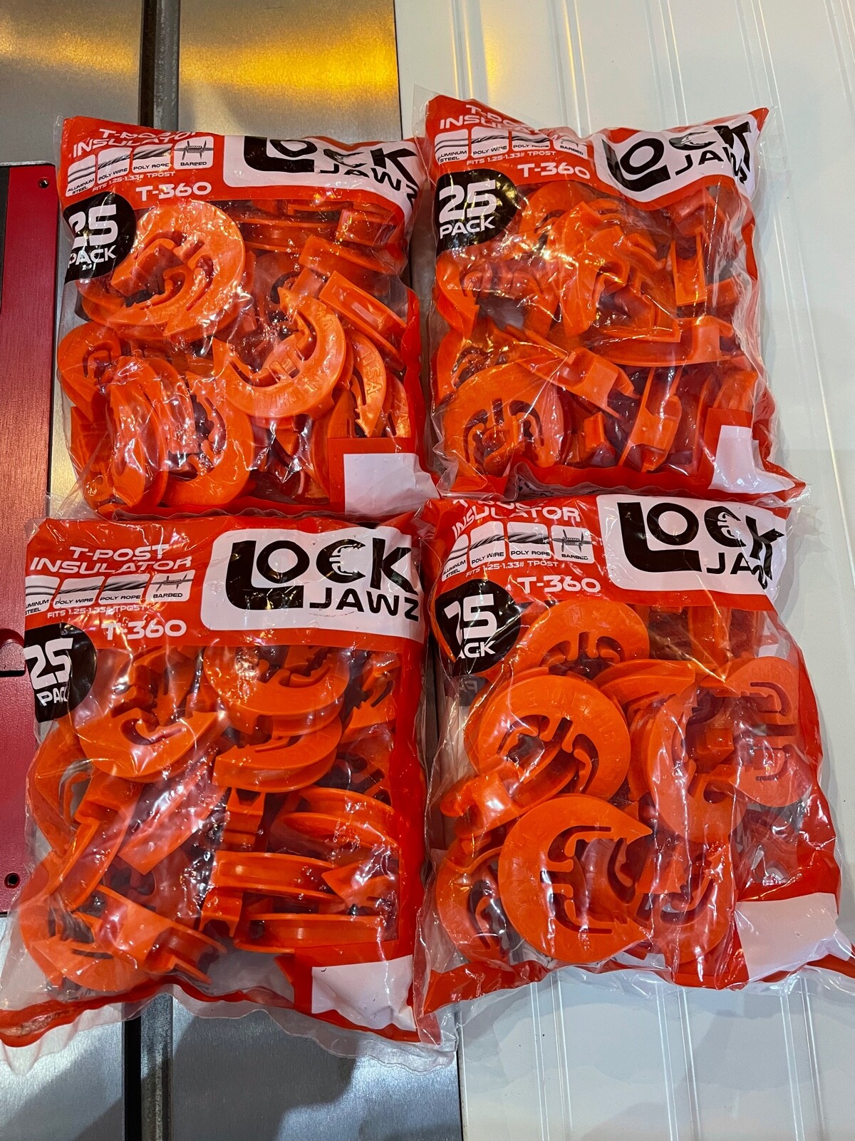 LockJawz Electric Fence T Post Insulators (25)pk – Orange (T-360)