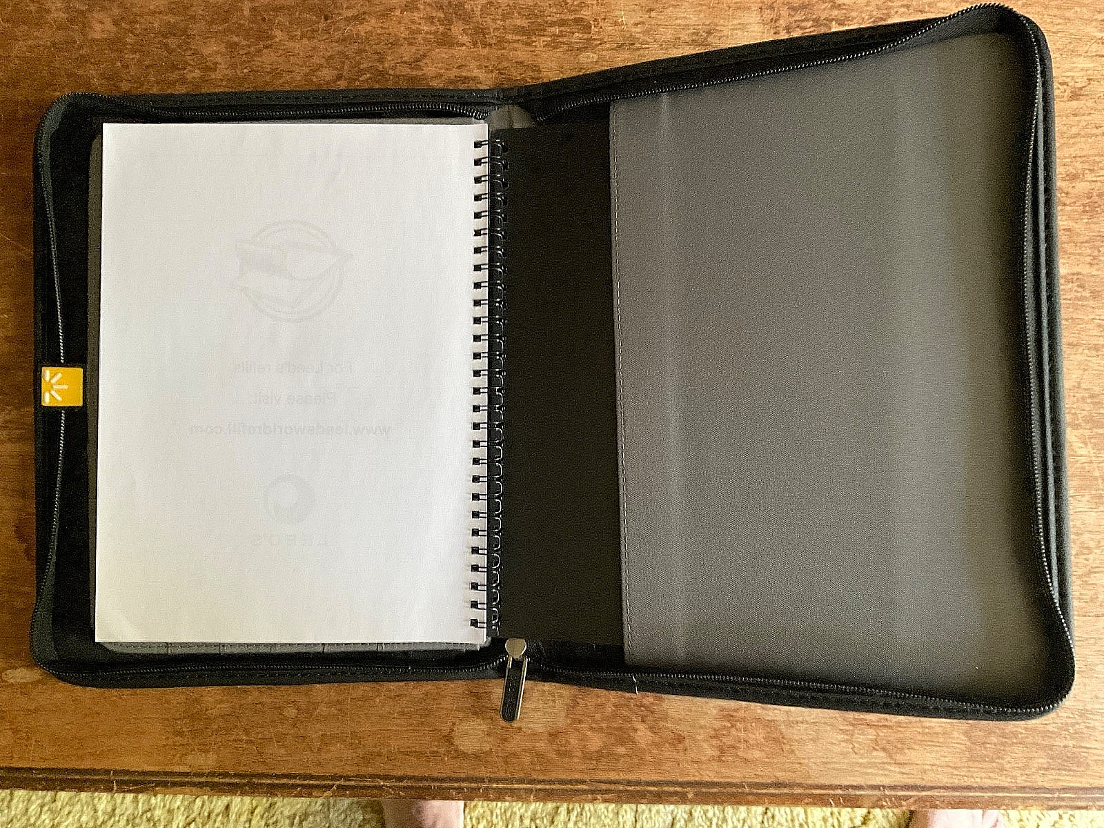 CHESTNUT WESTERN FLORAL EMBOSSED COWHIDE LEATHER NOTEBOOK ON A CASE LOGIC BASE