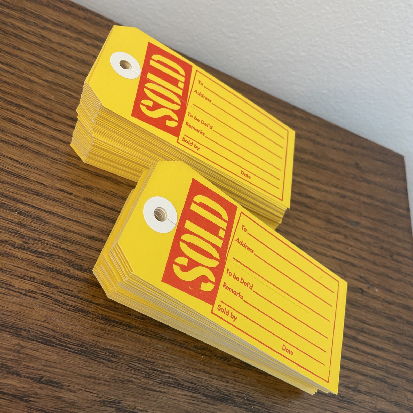 100 – SOLD Tags w/slit 4 3/4″ x 2 3/8 Nice Quality Reinforced Vintage Style