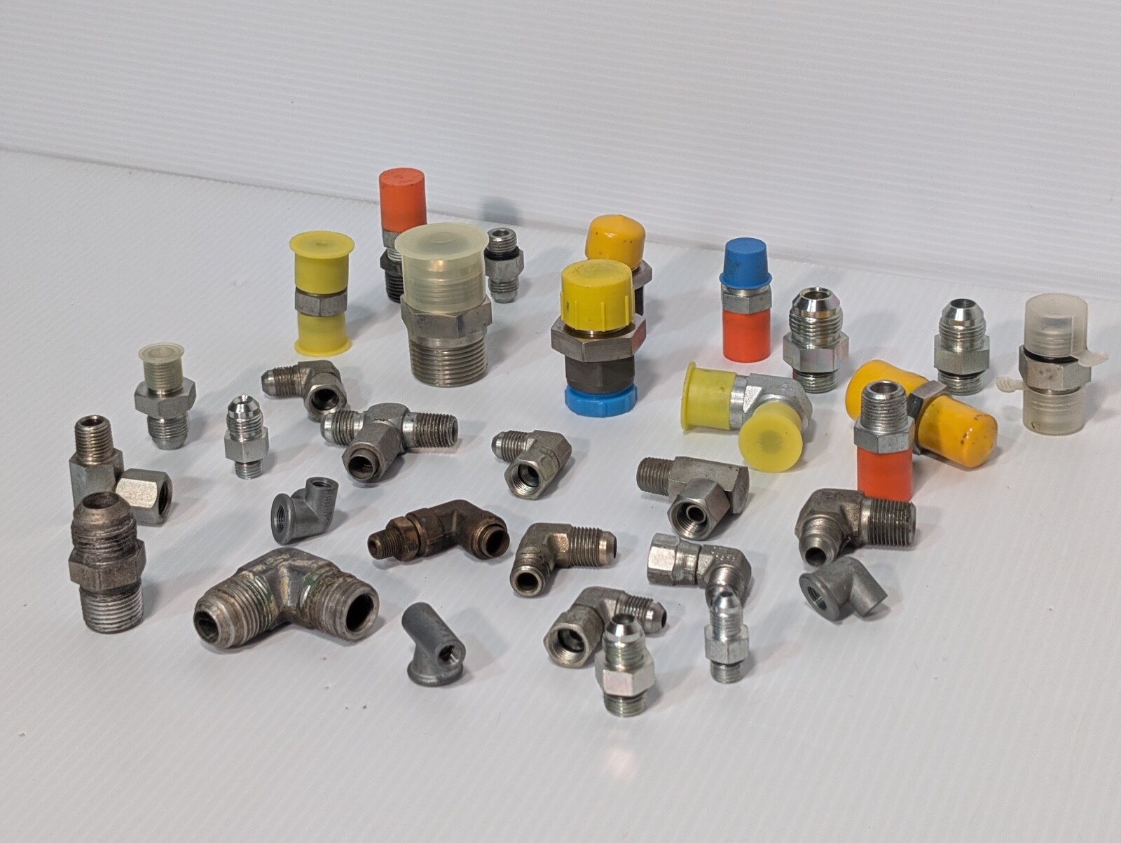 Mixed Lot of Female & Male Swivel Nut Elbow & Industrial Plug Fittings, as shown