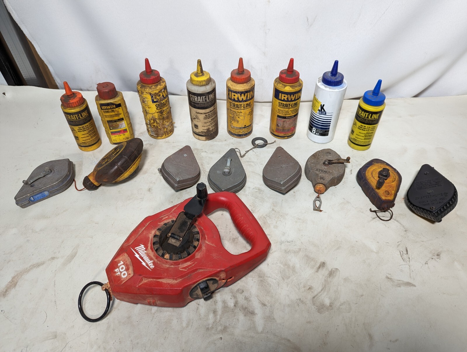 Lot of 9 chalk lines and 3.2 lbs of chalk: Milwaukee 48-22-3910, others