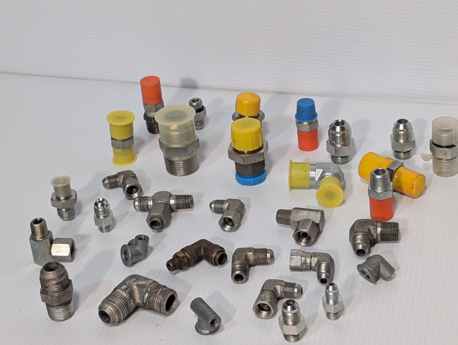 Mixed Lot of Female & Male Swivel Nut Elbow & Industrial Plug Fittings, as shown