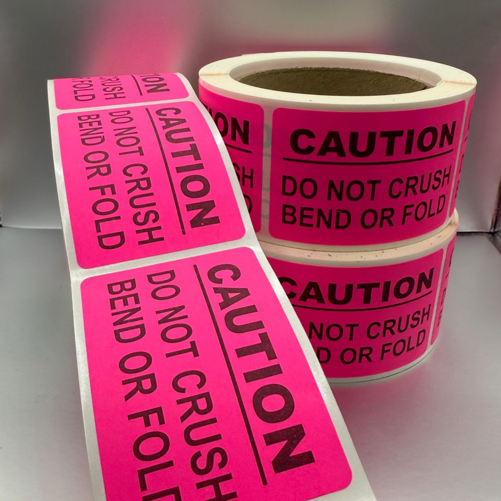 Neon Pink CAUTION Labels 2” x 3” – 250 Labels Per Roll