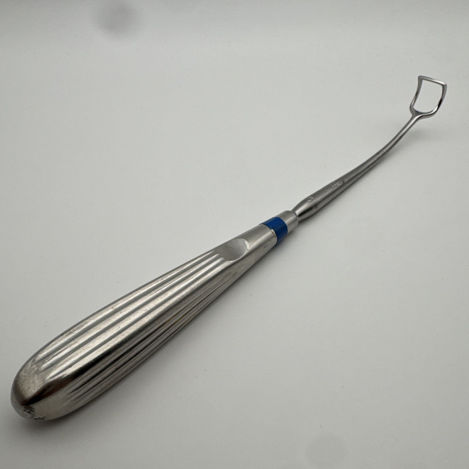 Storz N6010 Barnhill adenoid curette, size #0, reverse curved, 8.5»