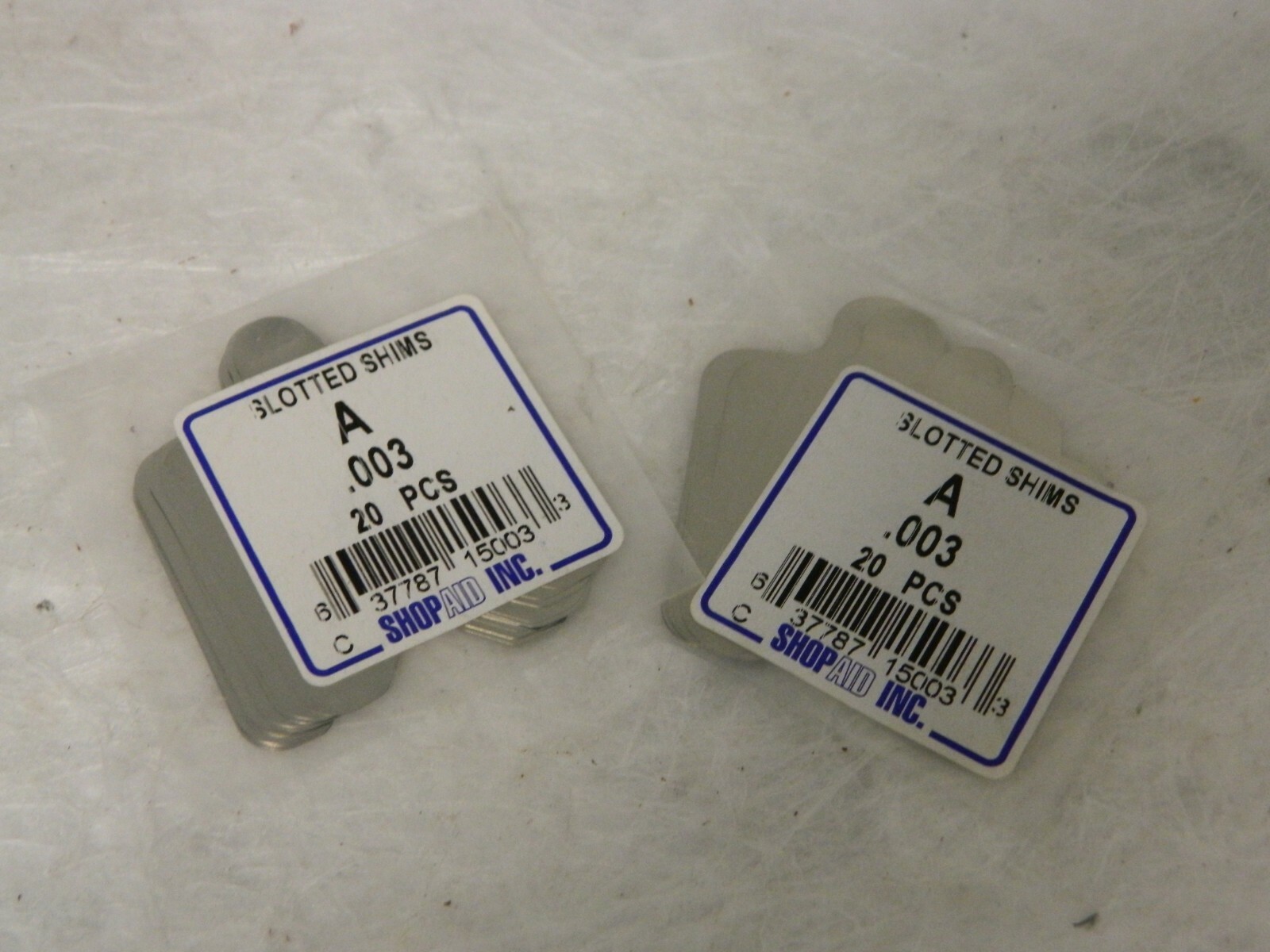 ShopAid Slotted Shim Stock 2″ Long x 2″ Wide x 0.003″ Thick Qty 40 00054379