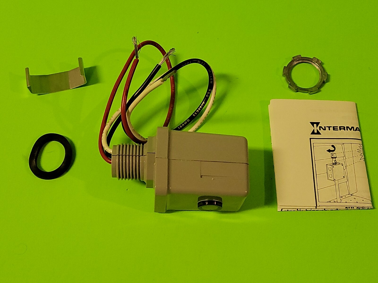 INTERMATIC Model K4123-8 Photo Control 208/277V 3100/4150W 8.3A (15A max).