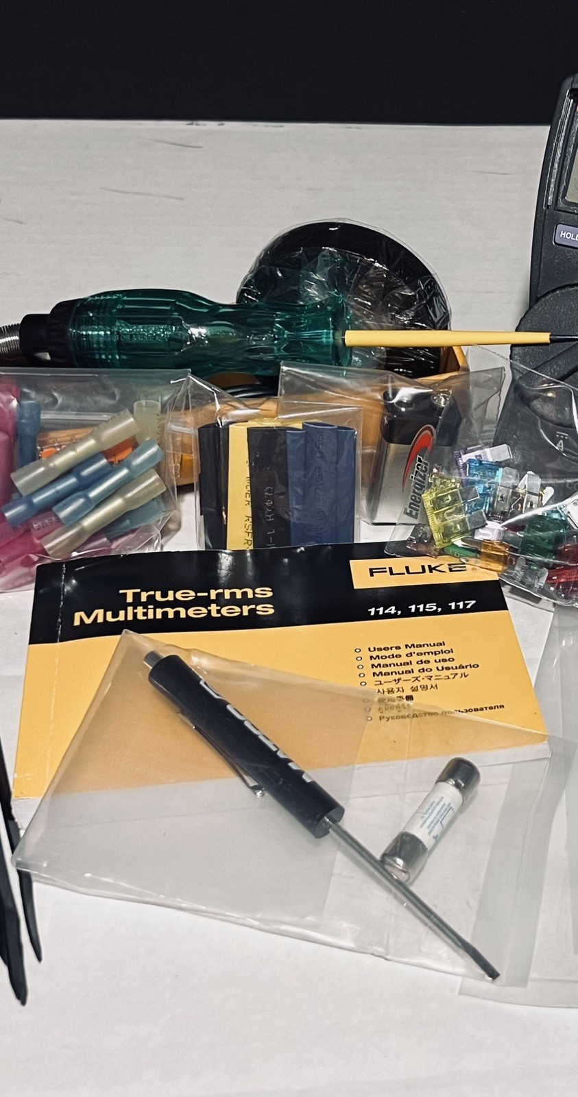 Fluke 115 True RMS Multimeter along with many Extras.
