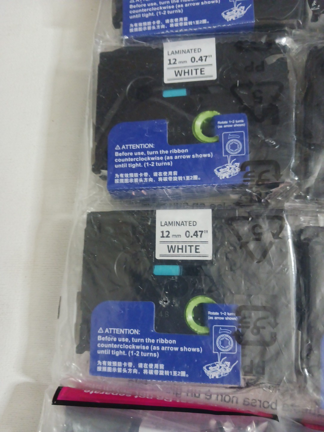 Laminated label tape 12mm 0.47″ white 231 black ink cartridge. Lot of 24 P-touch
