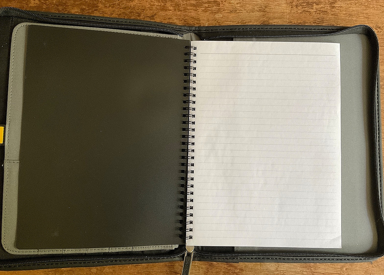 CHESTNUT WESTERN FLORAL EMBOSSED COWHIDE LEATHER NOTEBOOK ON A CASE LOGIC BASE