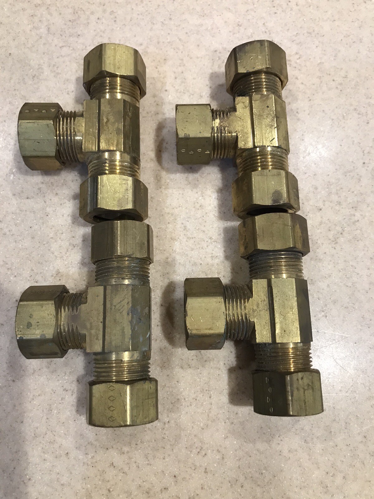 5/8” brass tee compression fittings 3 lots Of 4. new old stock. some tarnish