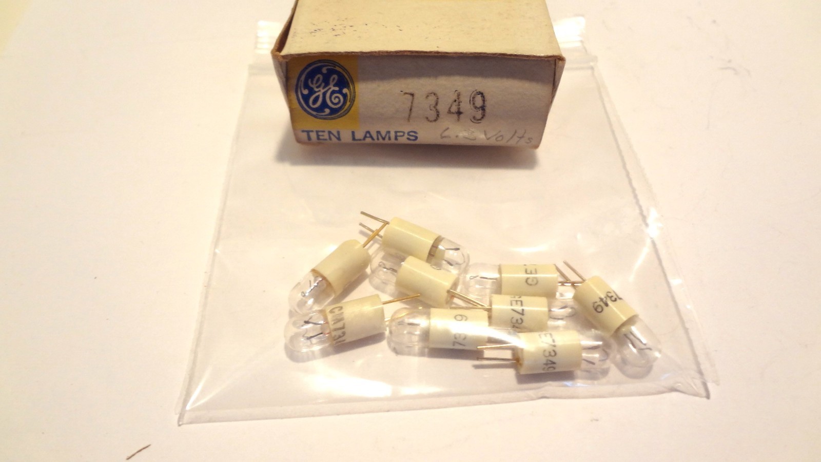 GE LAMPS # 7349 BOX OF (9EA) 6.3VOLT, 1. WATT MINATURE PIN BASE**NEW**