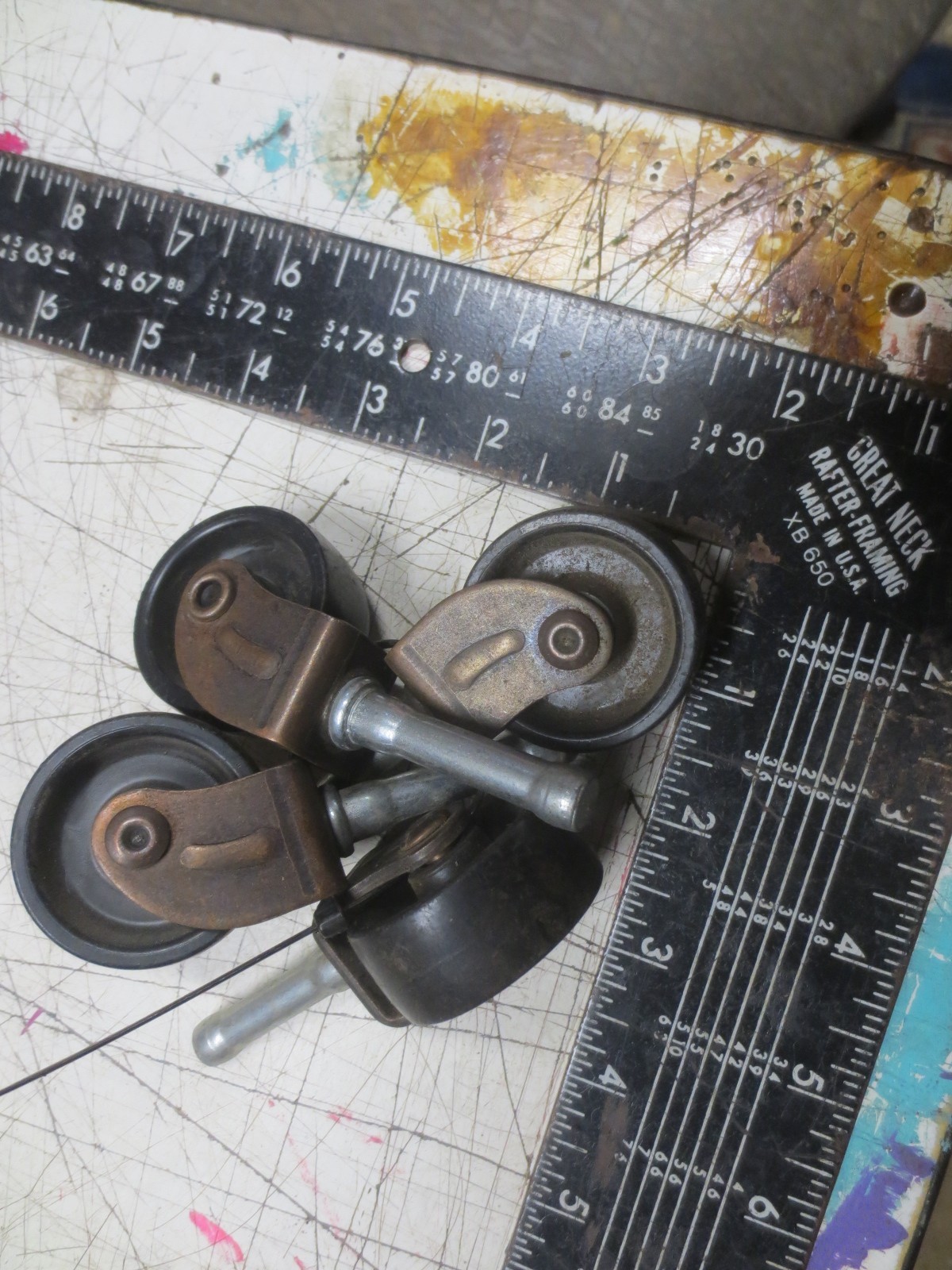Vintage Set of 4 Black plastic / nylon Casters – Copper tone metal