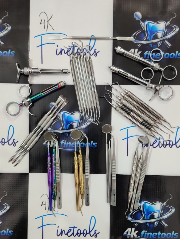 Lot of 33 mixed Dental Instruments (examination+restorative)including 4 syringes