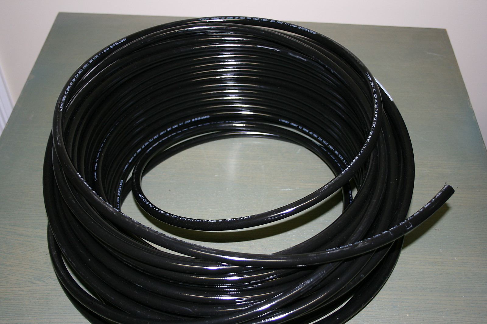 1/4″ HYDRAULIC THERMOPLASTIC HOSE 50 FT. 100R7 2750 PSI GATES (SYNFLEX STYLE)