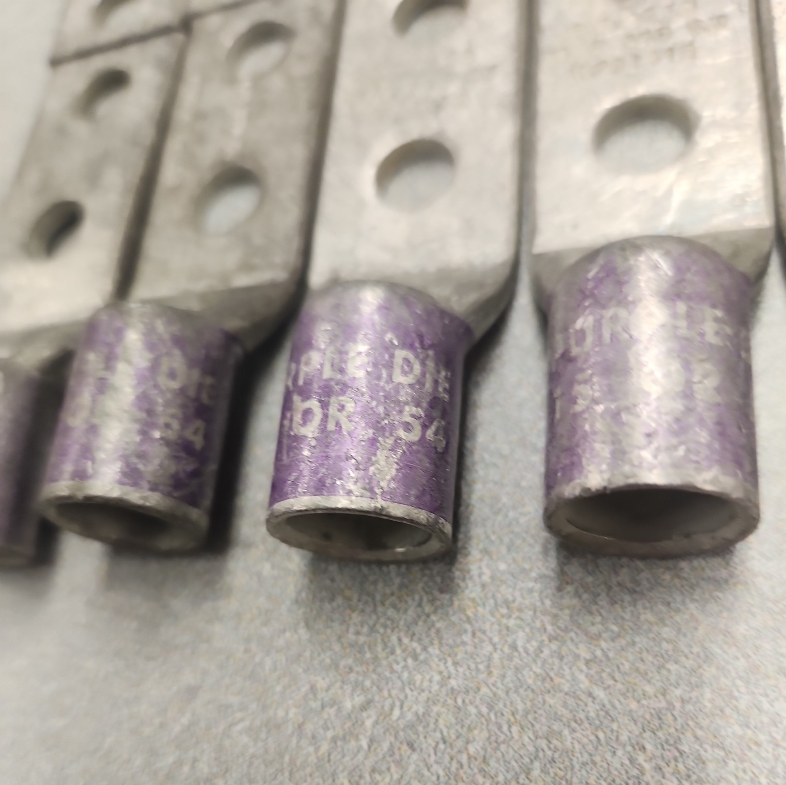 (10) Lug Ends 3/8″ X 1″ spacing 4/0 AWG STR CU Purple Die 15 54