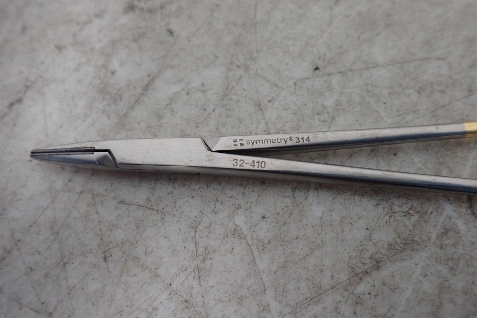 (7) Symmetry 32-410 Needle Holder, Miltex 72-10 TC Gripper, gS 13.7520 Scissors