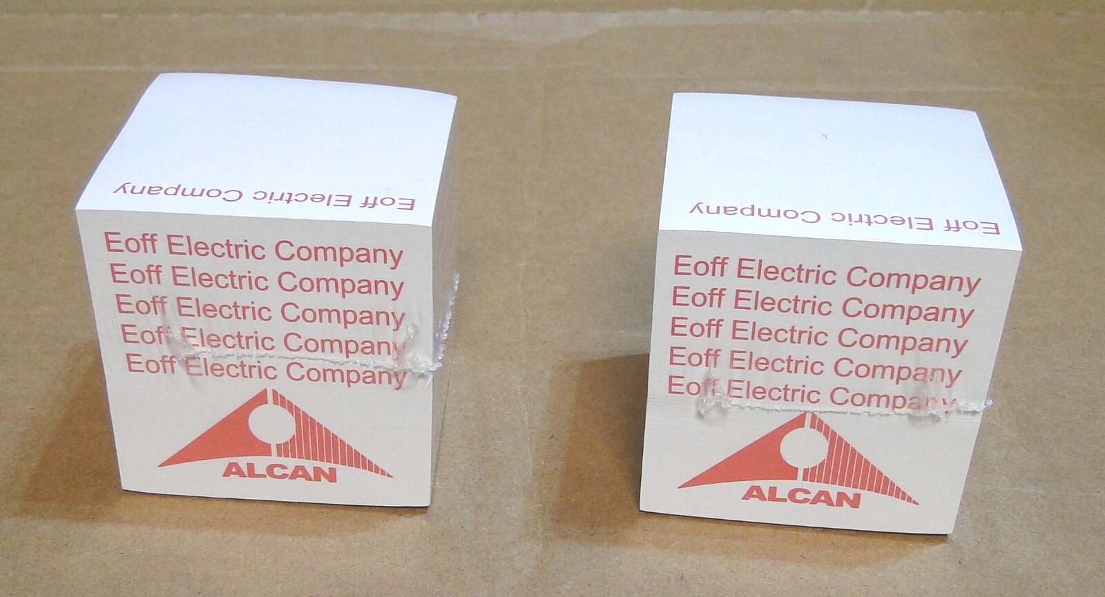 Two 3M 3×3 Post-It Notes Cubes w/Advertising: Alcan, G.E., Eoff Electric Company