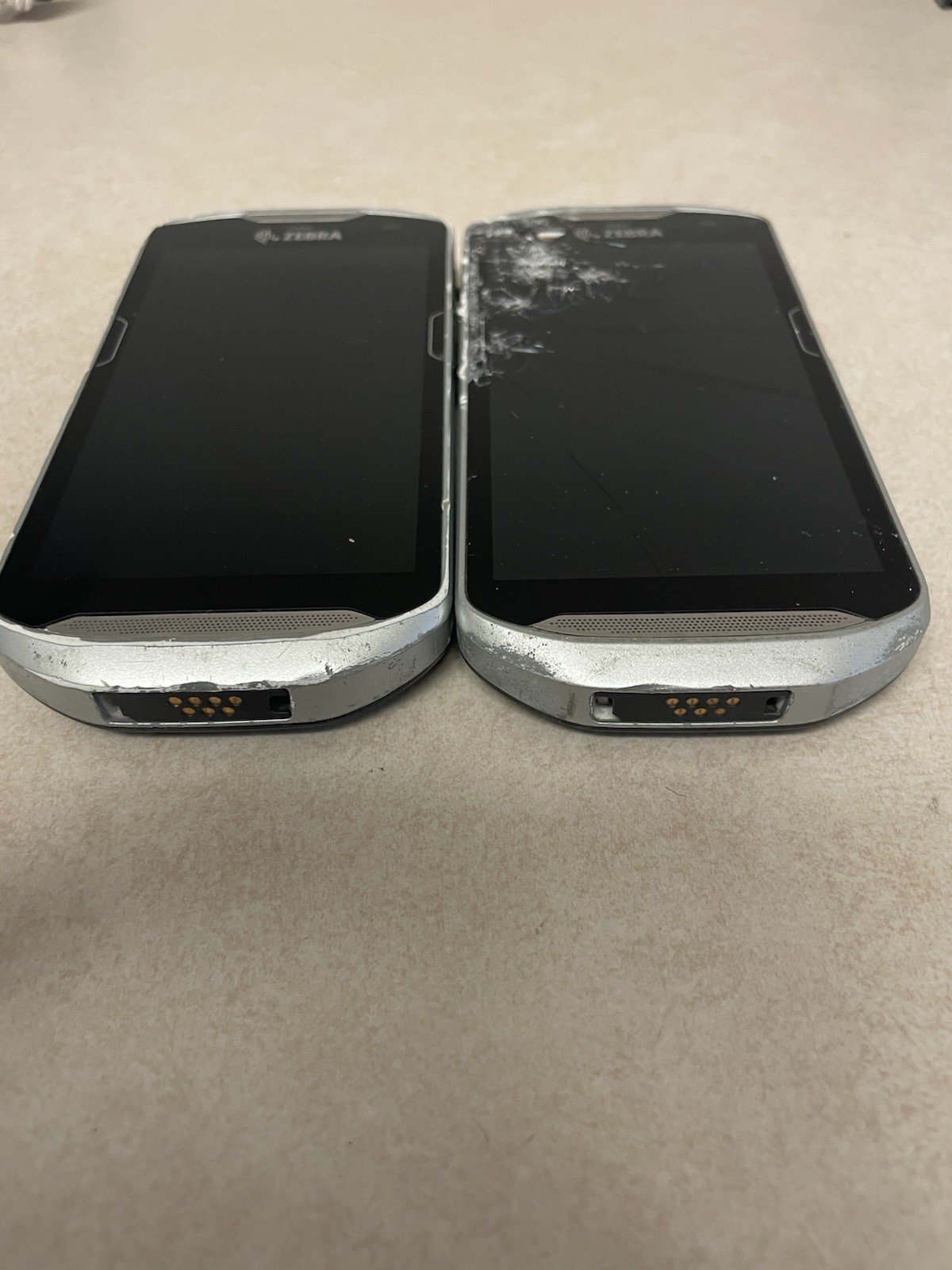 Lot of (2) Zebra TC56CJ-1PAZU4P-25 Mobile Computer AS IS FOR PARTS NOT WORKING