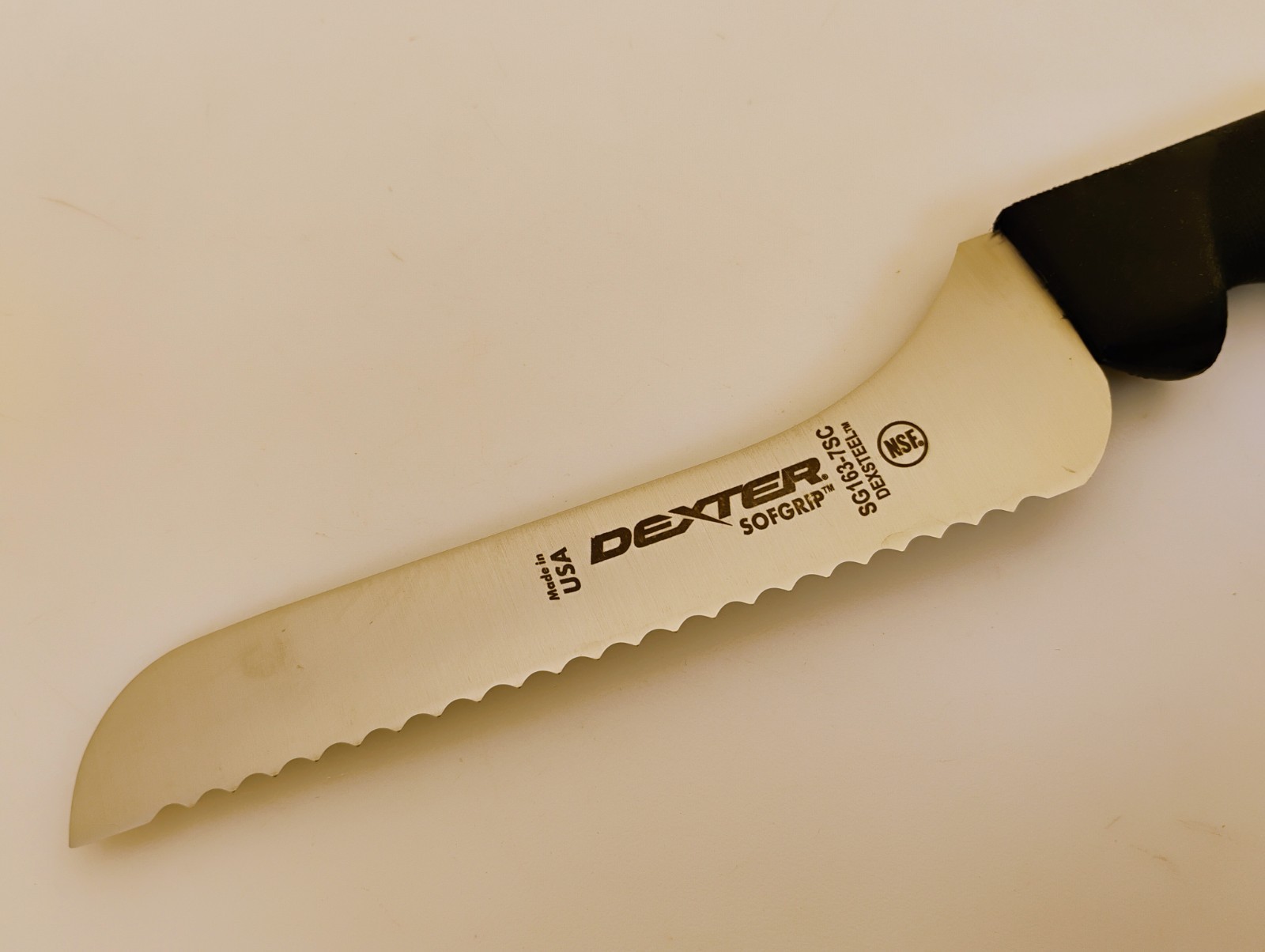 Dexter USA 7 inch Offset Blade Scalloped Edge Bread Knife Black Handle SG163-7SC