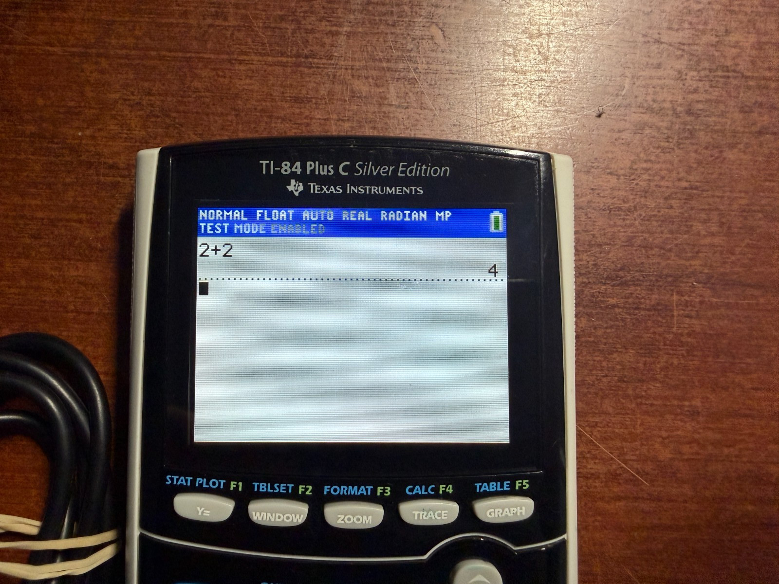 Texas Instruments TI-84 Plus C Silver Edition Graphing Calculator + Cable