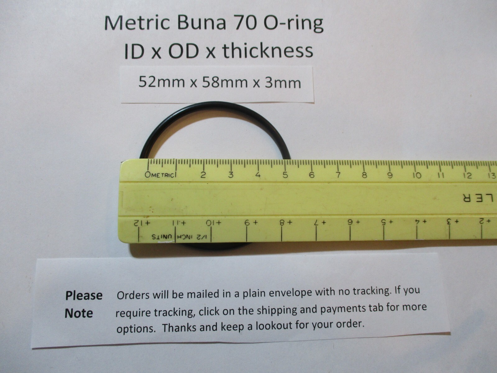 52mm ID x 58mm OD x 3mm thick O-ring. Buna-70. Quan 1.
