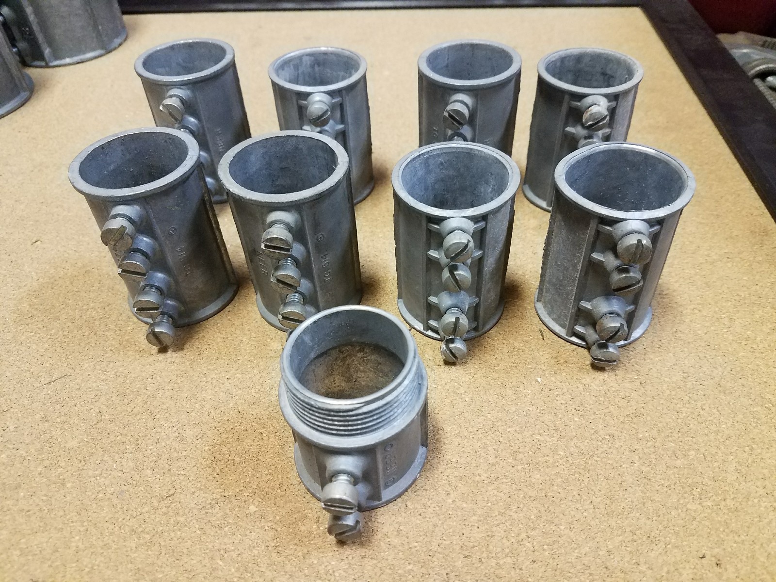 Lot of (8), NEER TC-514 & unbrand EMT SET SCREW COUPLING 1-1/4 ZINC & (1) TC 504