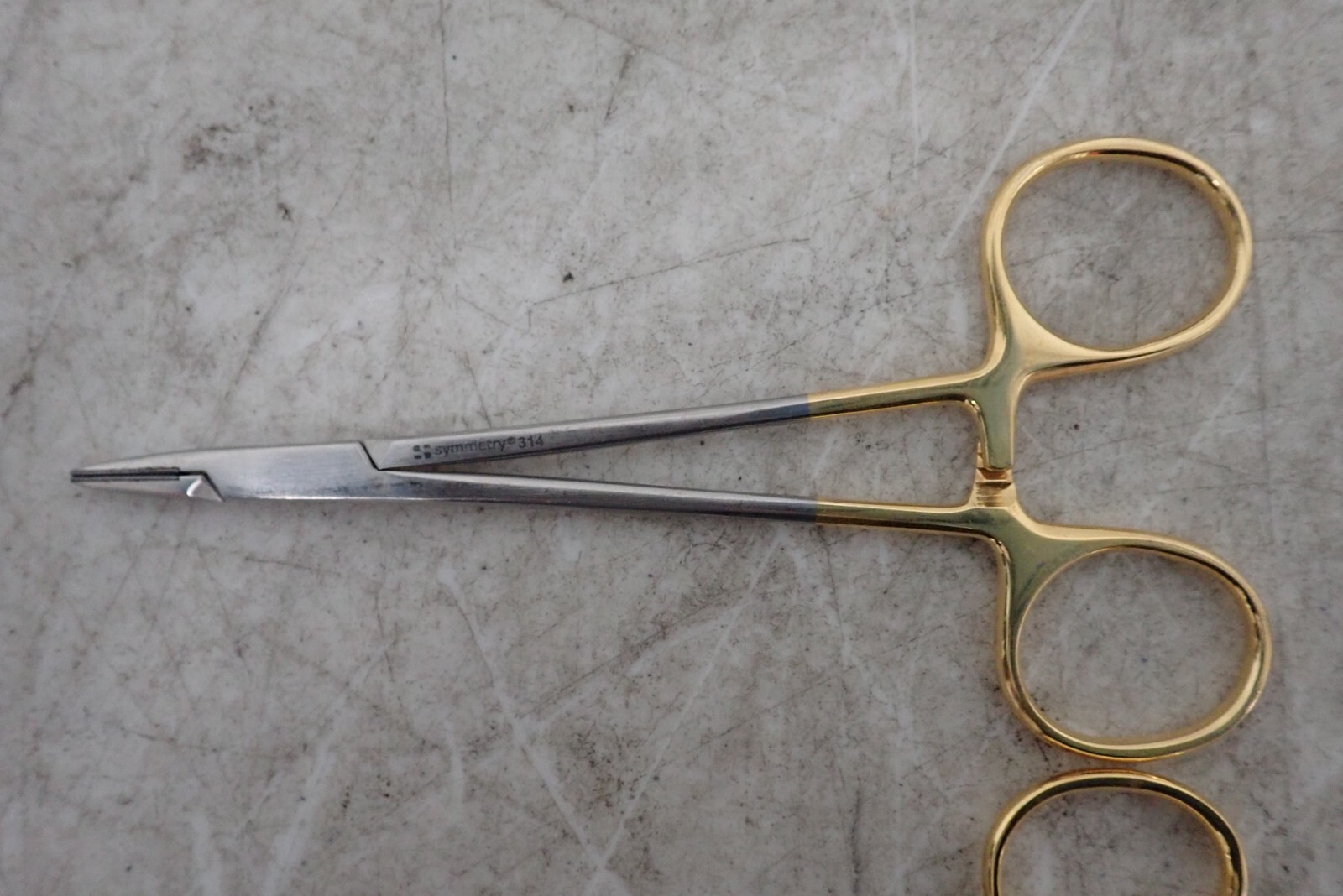 (7) Symmetry 32-410 Needle Holder, Miltex 72-10 TC Gripper, gS 13.7520 Scissors