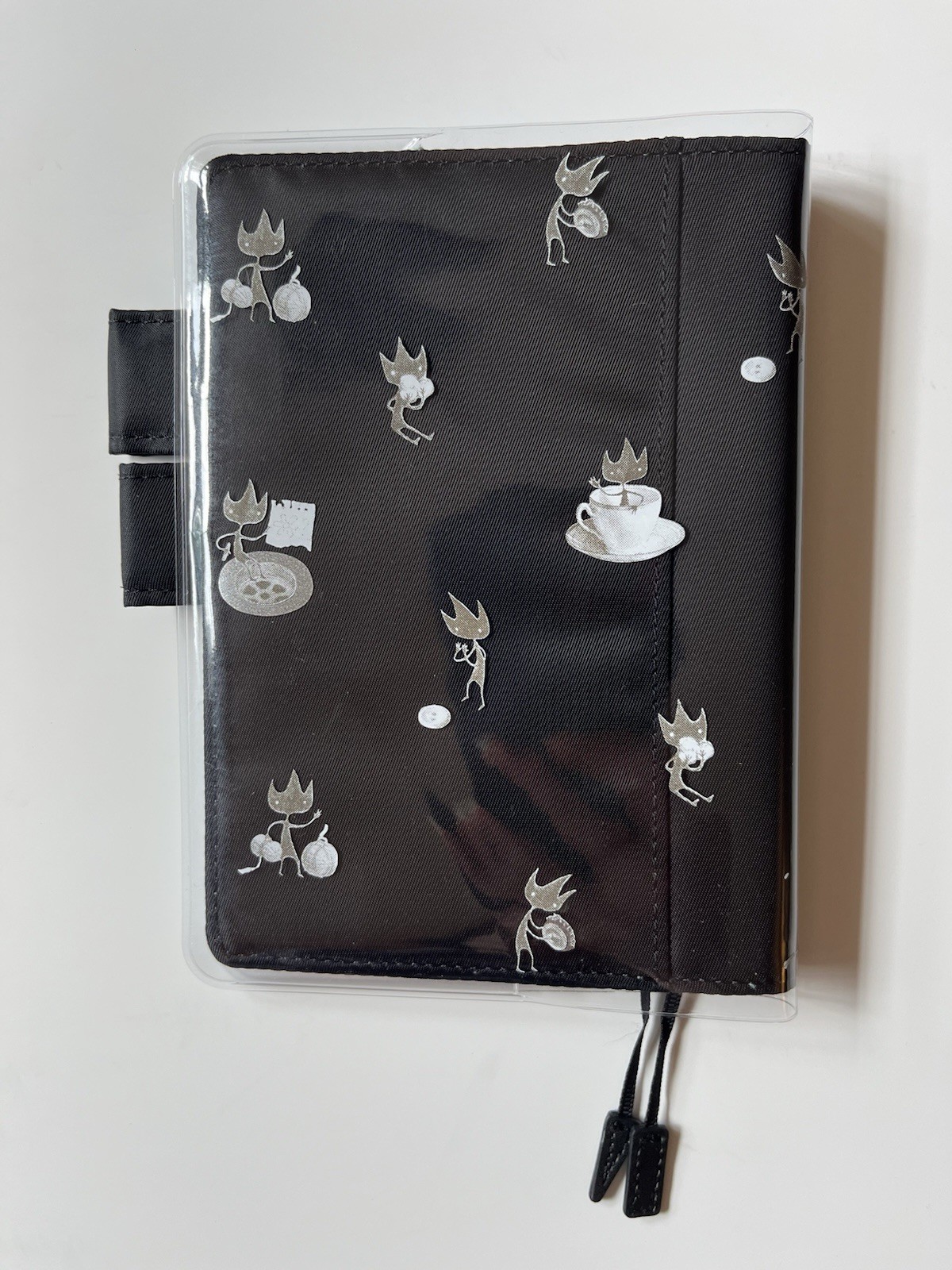 Hobonichi A6 Cover (Black/Blue) And “Eric” Shaun Tan Cover On Cover