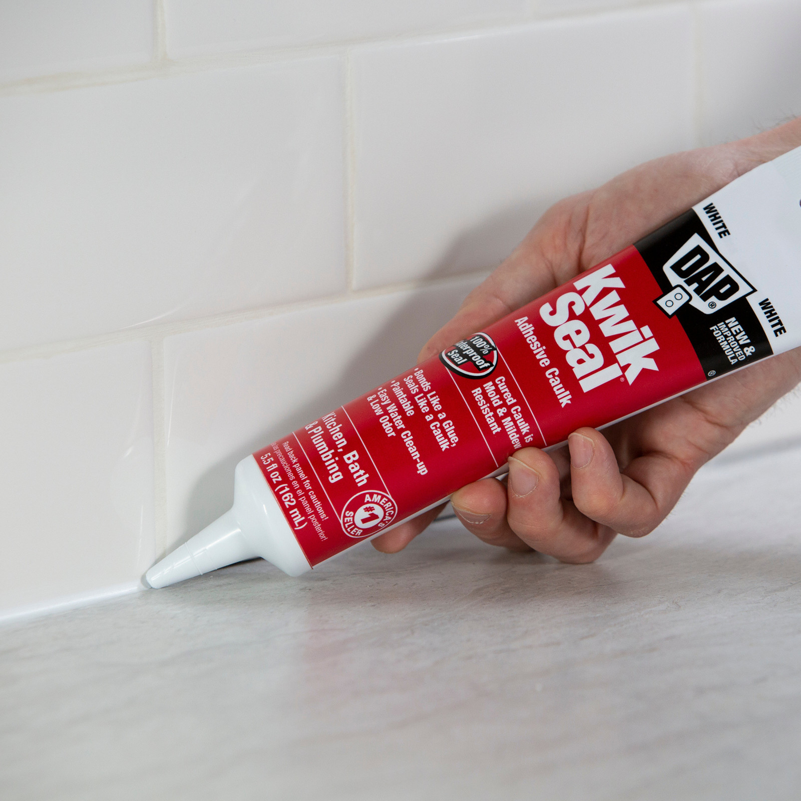 DAP KWIK SEAL Kitchen & Bath Adhesive Caulk: 10.1 fl. oz. cartridge (White)