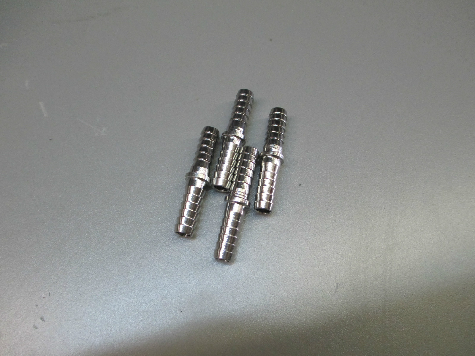 (4) 1/4″x 1/4″ BARB SPLICERS. STAINLESS STEEL FITTINGS