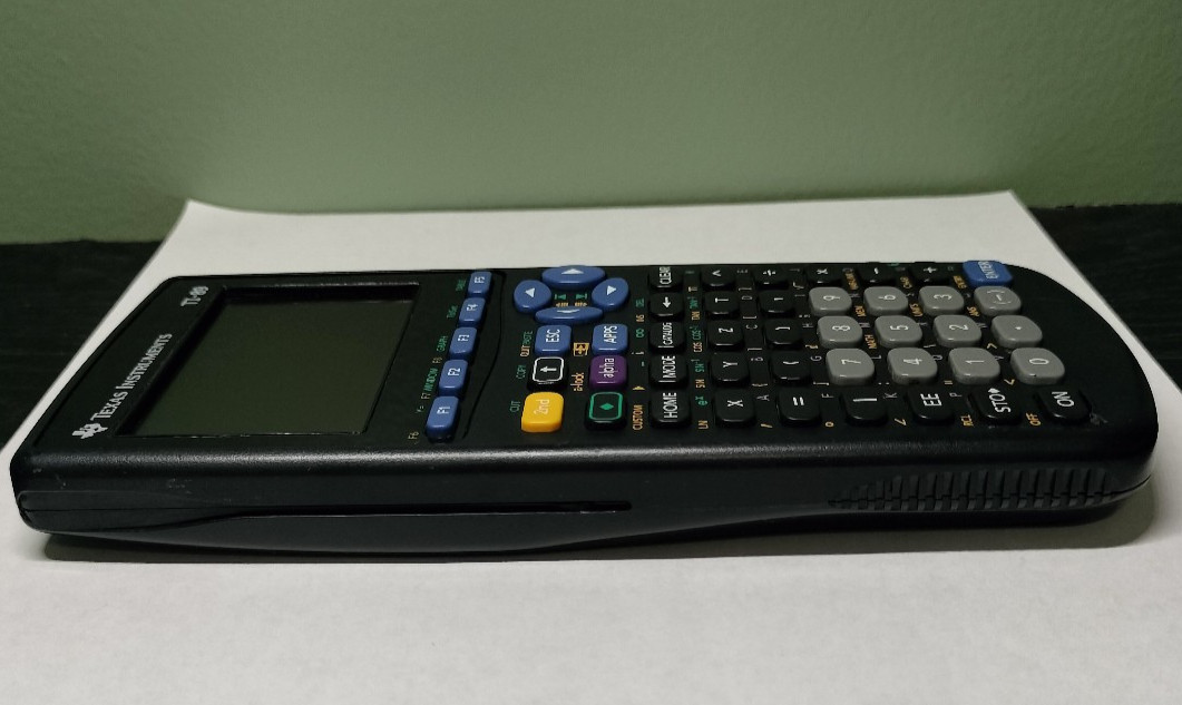 Texas Instruments TI-89 CAS Graphing Calculator – Tested Works No Batteries/Case