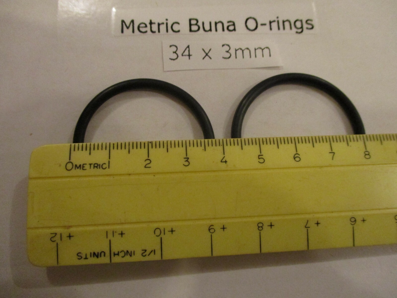 34mm ID x 40mm OD x 3mm thick O-ring. Buna-70. Quan 2.