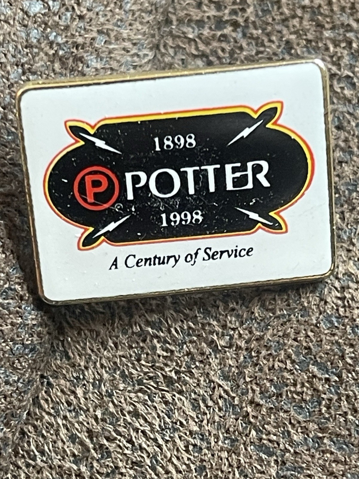 Potter Electric Signal Company centennial pin