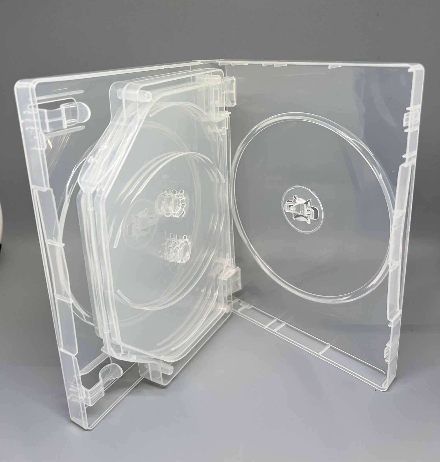 25 PCS NEW HIGH QUALITY 27MM MULTI-8 DISC DVD CASE, M-LOCK HUB, CLEAR, DB27-8C