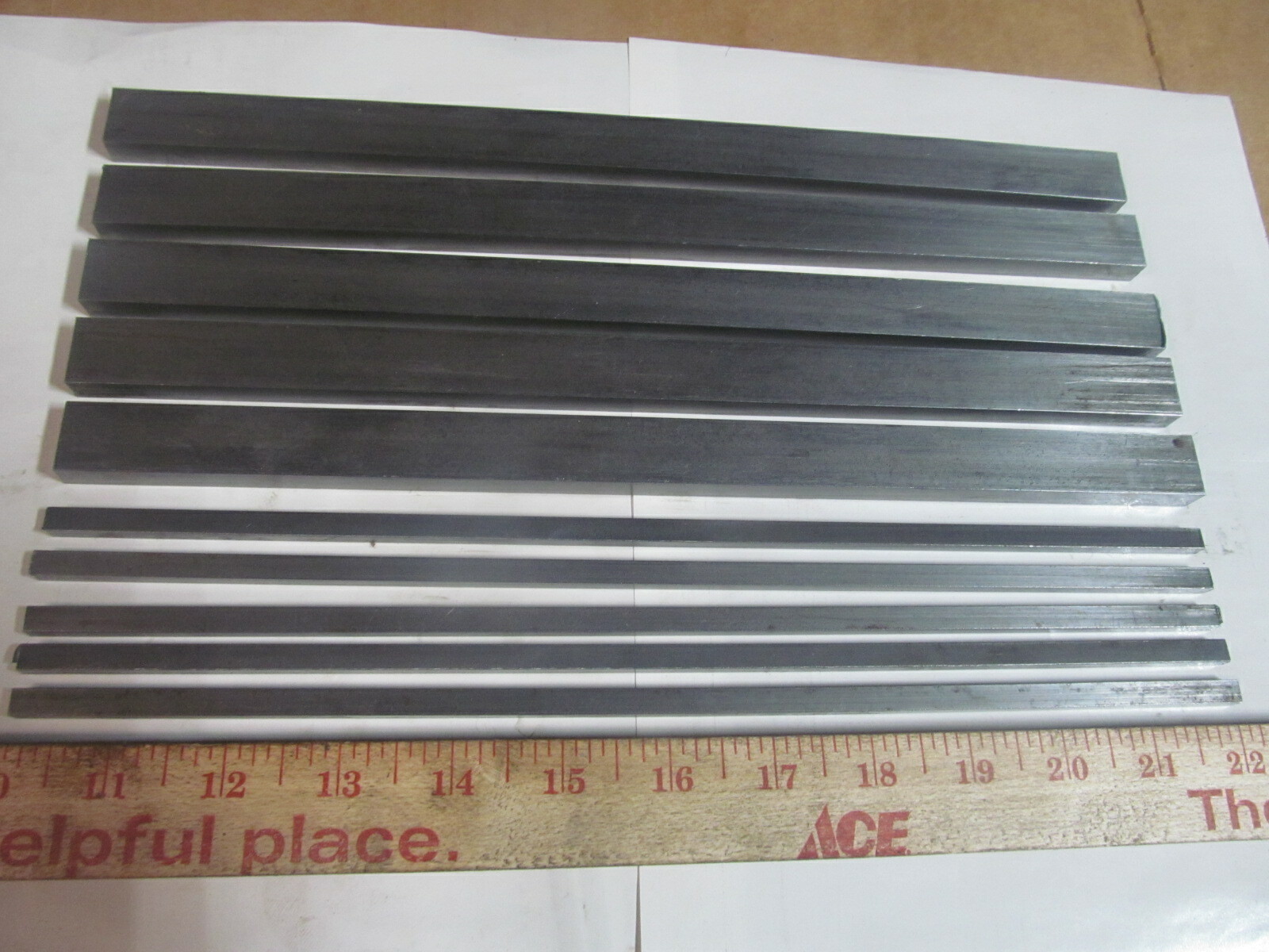 (10) PIECES OF RECTANGLE STEEL,12L14 BAR STOCK 12″ LONG (2) DIFFERENT SIZES.